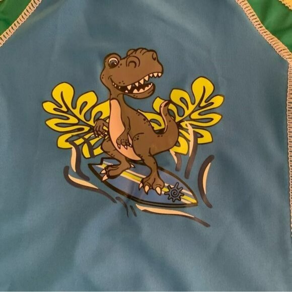 UV skins boys rashguard with surfing dinosaur in blue and green -12/18M - Picture 3 of 8